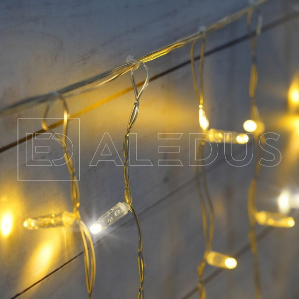 фото Бахрома (Айсикл) ALEDUS, 220 В, 3x0.9 м, прозрачный провод, теплый белый, с мерцанием